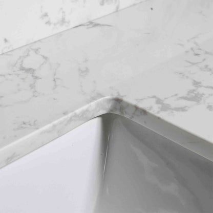 Corner detail of a 43 x 22 Carrara marble vanity top sink with 3 faucet holes
