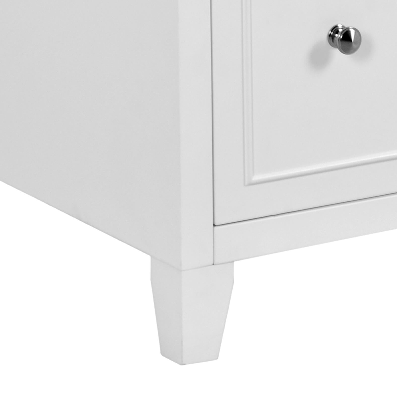 Detail of the legs of a 30 white bathroom vanity with 2 left side drawers