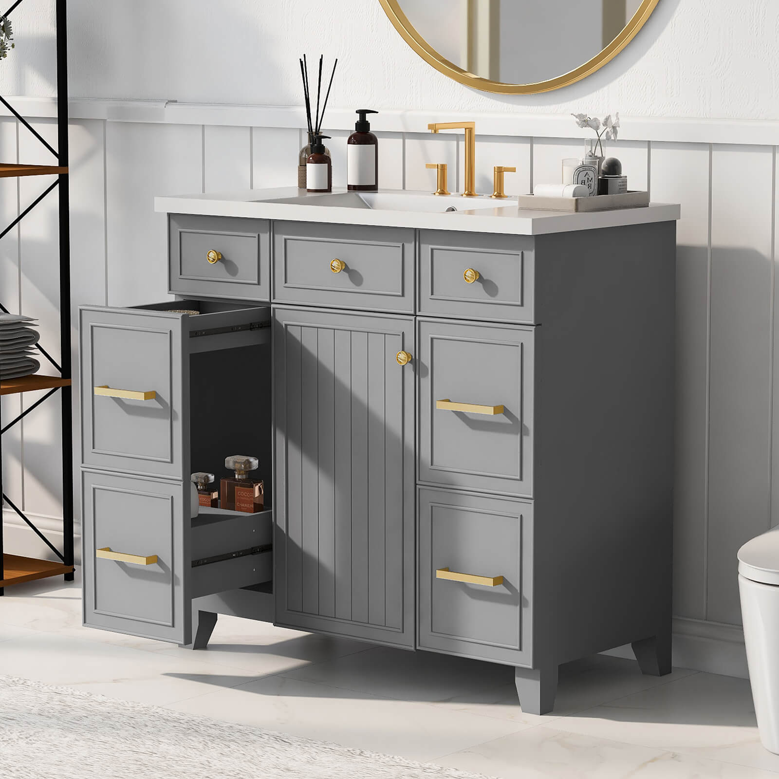 Grey vanity with gold drawer pulls and sleek design for contemporary bathrooms