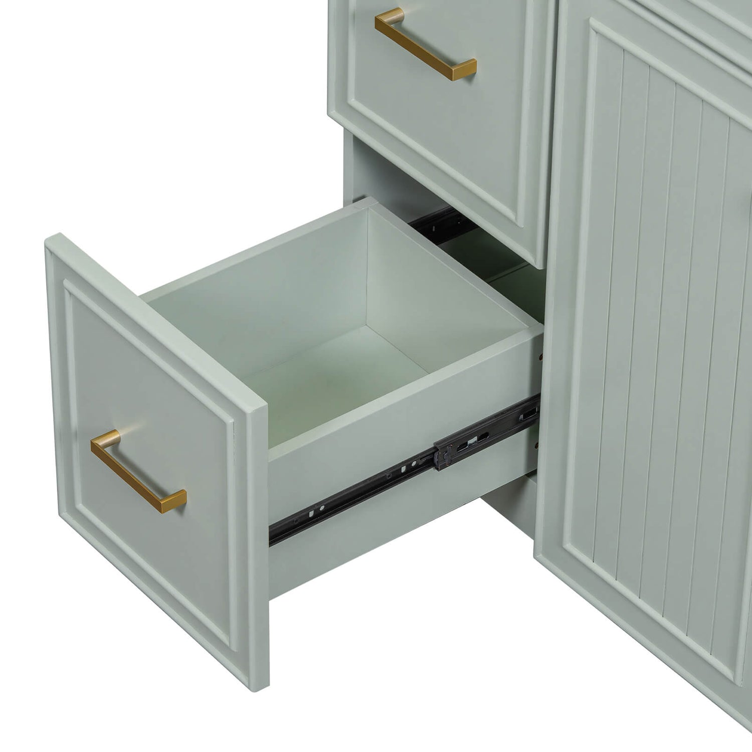 Light grey-green vanity with matte gold handles