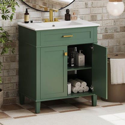 Modern green bathroom vanity with gold tone metal handles