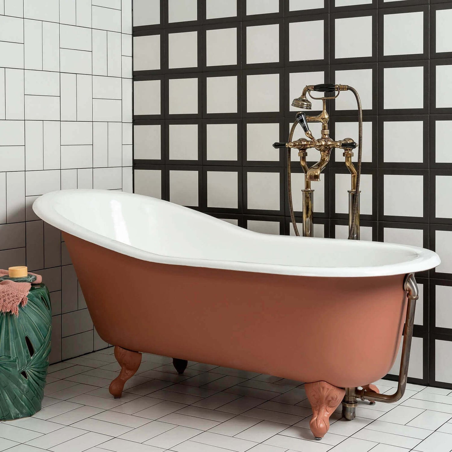 Orange finish cast iron clawfoot bathtub