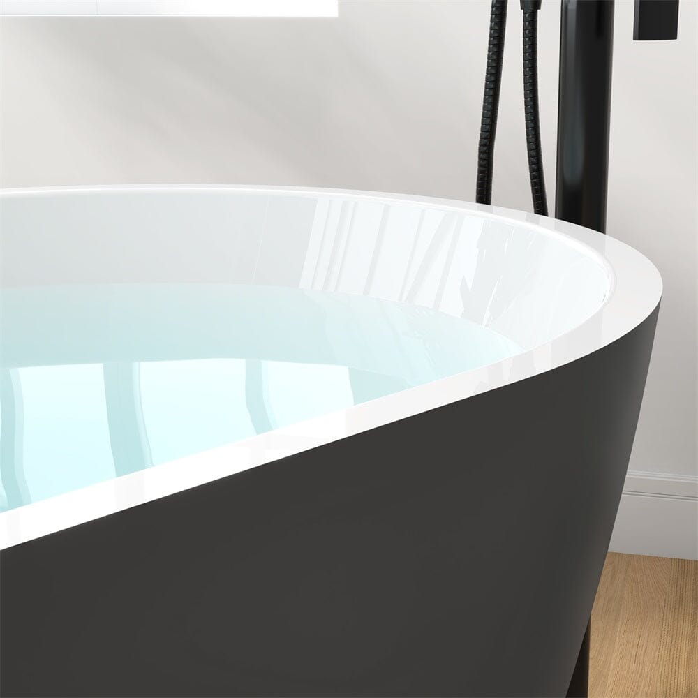 Edge detail of gray freestanding soaking tub with overflow